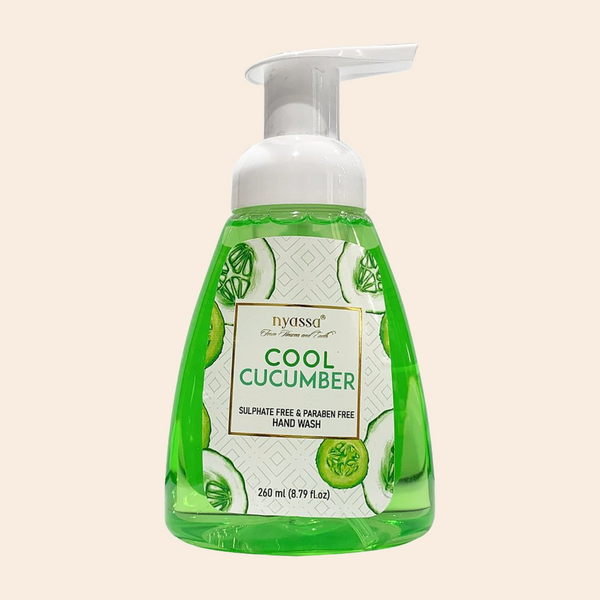 A pump bottle of Nyassa Cool Cucumber Foaming Handwash with a green label and white text.