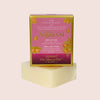 Bar of soap with a pink packaging box labeled 'Argan Oil' on a light pink background