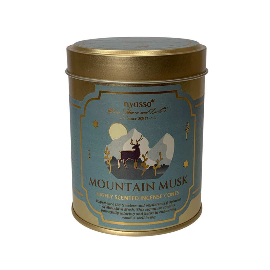 Tin container labeled 'Mountain Musk' with a deer illustration on a white background