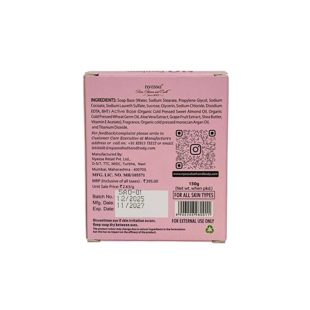 Back view of a pink soap packaging with text and bar code on a white background
