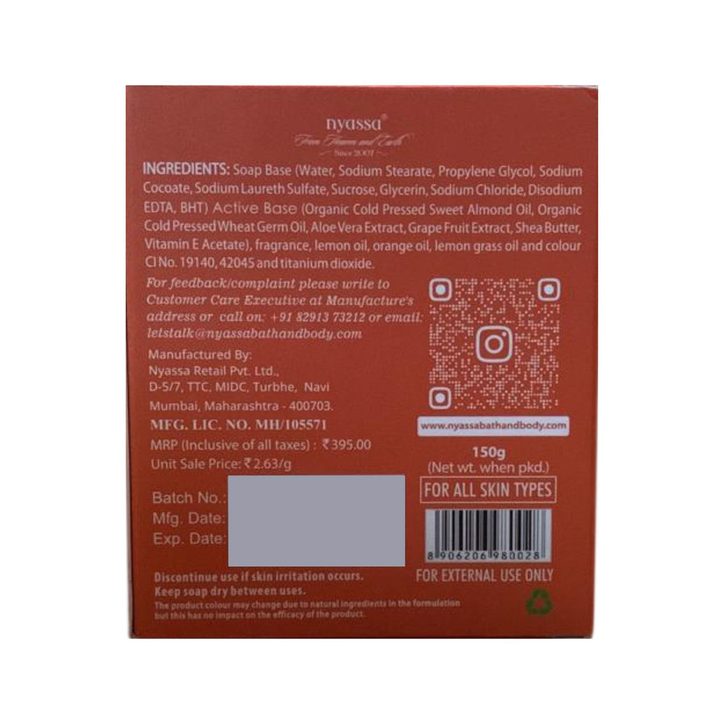 Back view of a soap packaging with ingredient list, contact information, and product details.