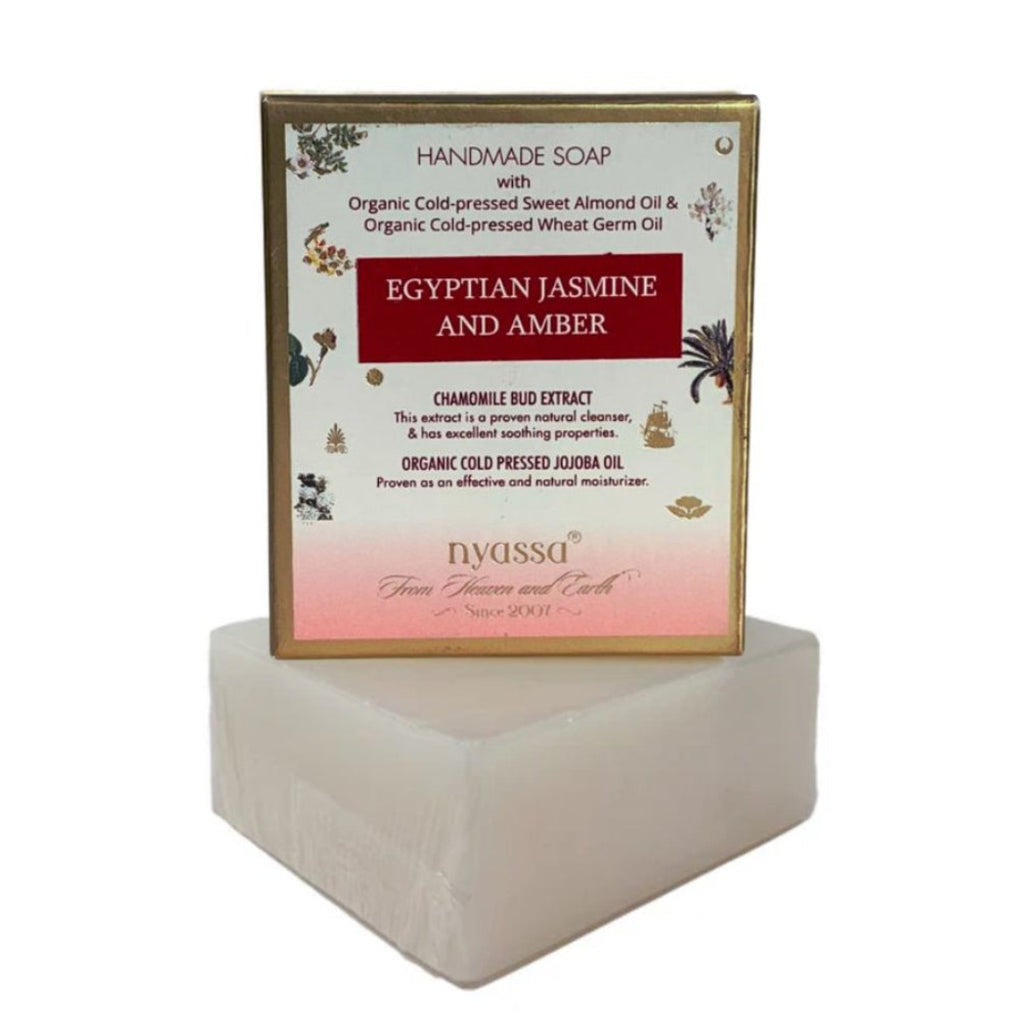 Handmade soap with aNyssa packaging on a white background