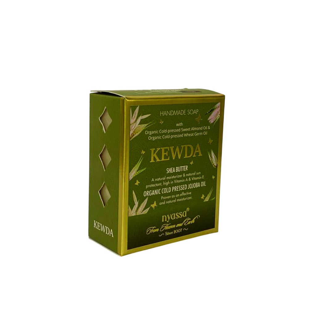 Green box of Kewda handmade soap with branding and product details on a white background